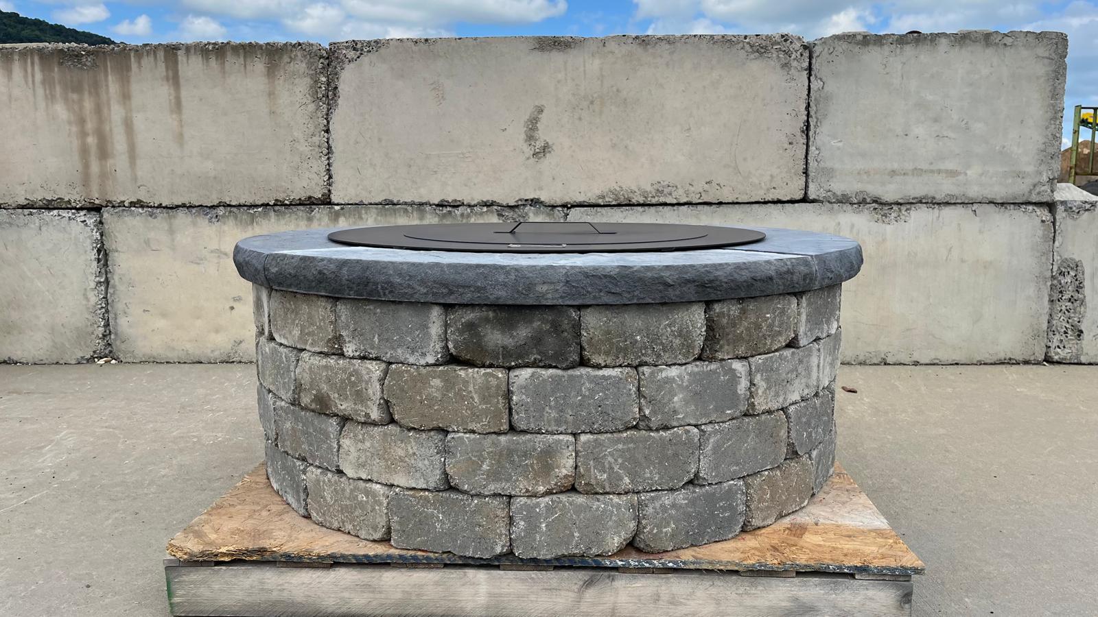 Outdoor fire ring with smokeless insert.