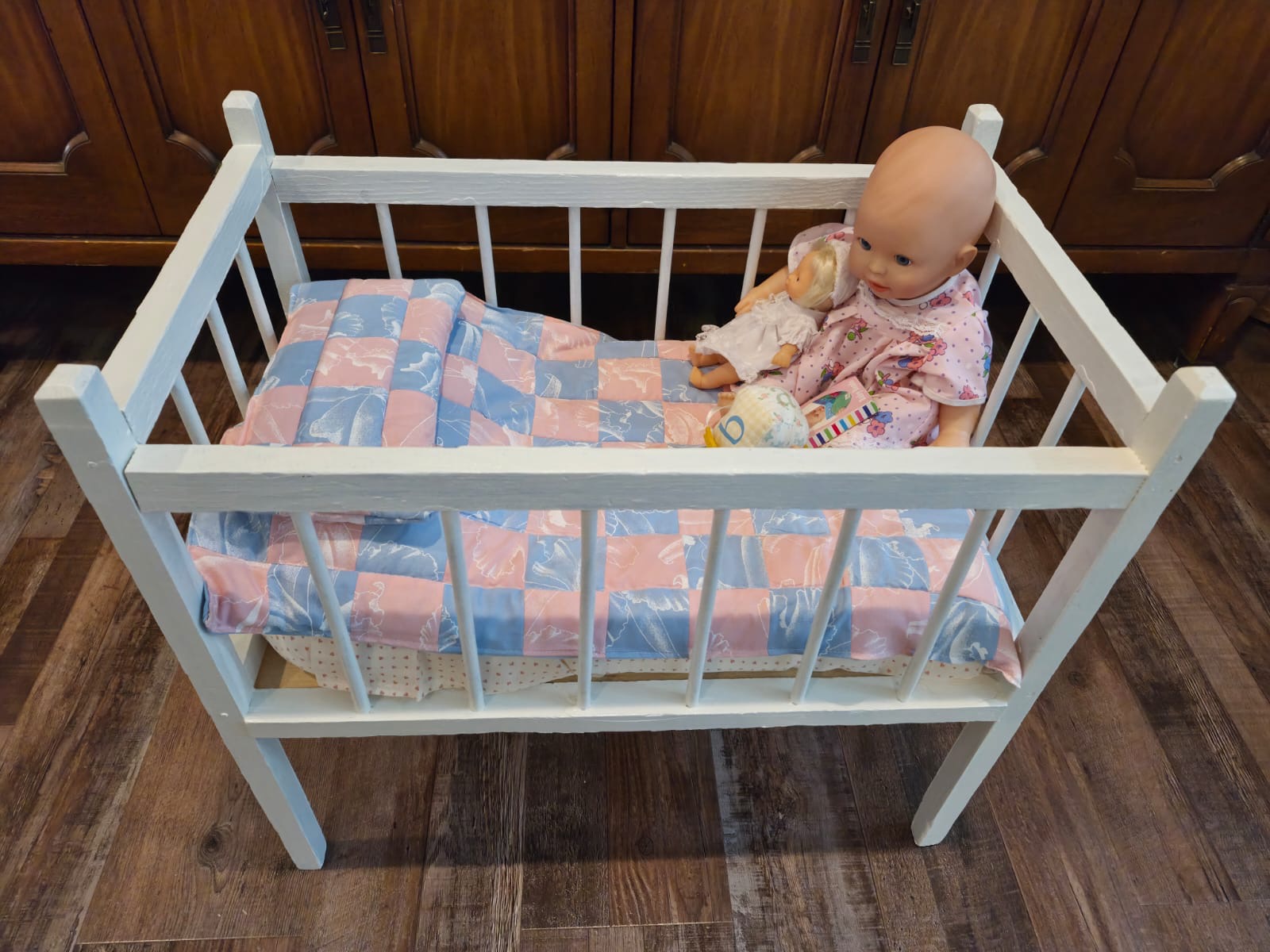 Doll with doll crib set up
